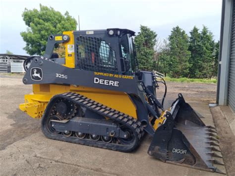 john deere skid steer with on a trailer|used john deere skid steer for sale.